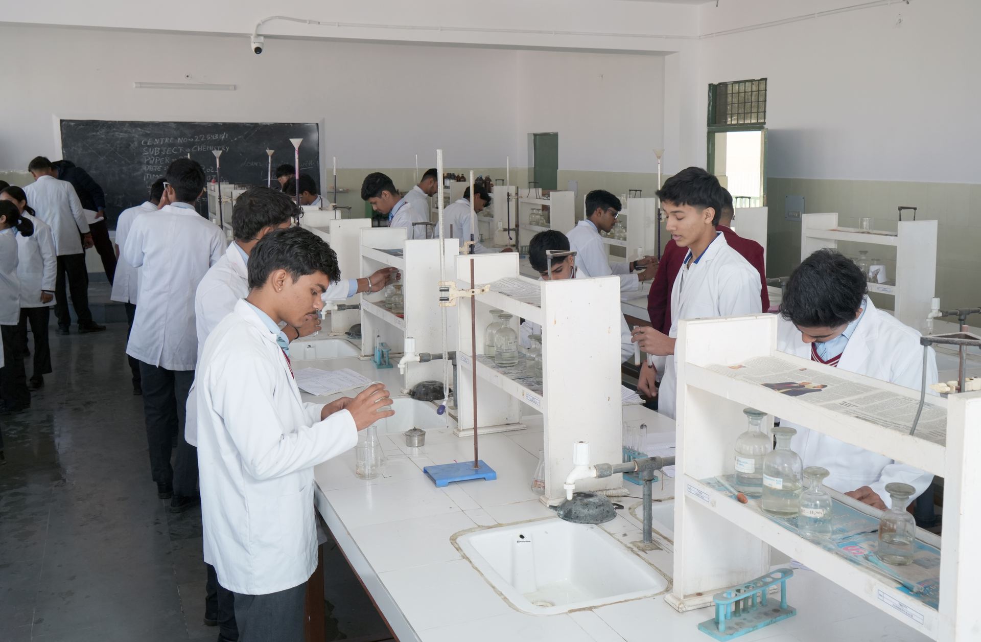 Students in the biology laboratory learning with microscopes