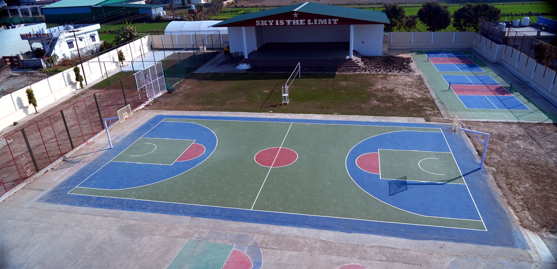 Aerial view of the school sports court and stage area